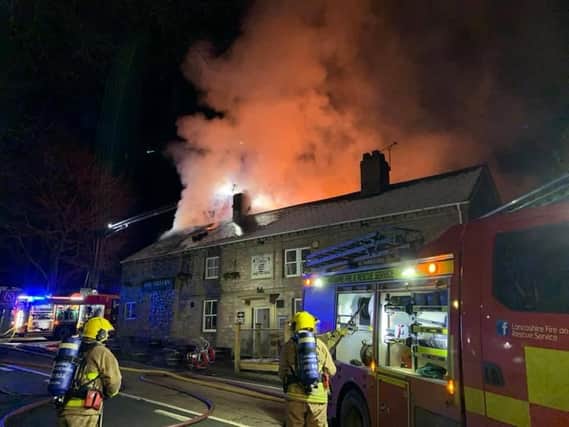 The Sirloin pub ablaze. Photo: Andrew Dunn