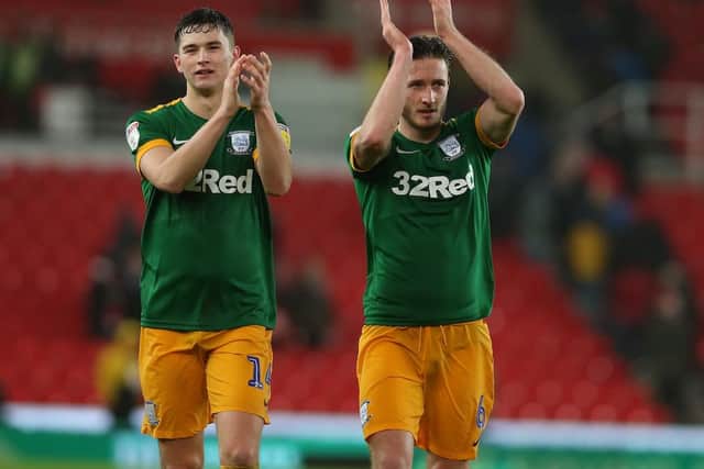 Davies and Jordan Storey salute the PNE fans after the win over Stoke