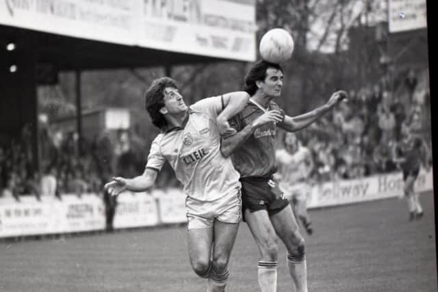 Preston's David Johnson challenges with a York defender for the ball at Bootham Crescent in May 1985