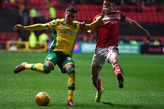Norwich City's Max Aarons (left) is tackled by Blackburn Rovers' Harrison Reed during the Sky Bet Championship match at Ewood Park, Blackburn.