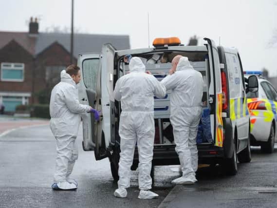 Forensics at the murder scene in Village Drive, Ribbleton.