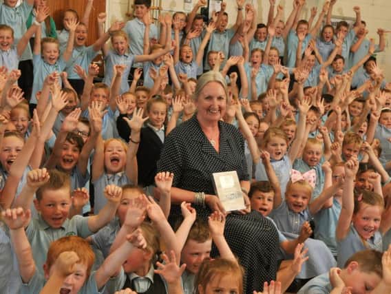Janis Burdin received a Lifetime Achievement Award  after making history as the first and longest serving head at Moss Side Primary School in Leyland