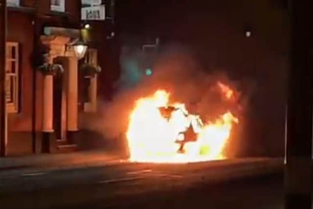 The car on fire outside the Lane Ends pub in Preston (Photo and video courtesy of Jonno Wilson)