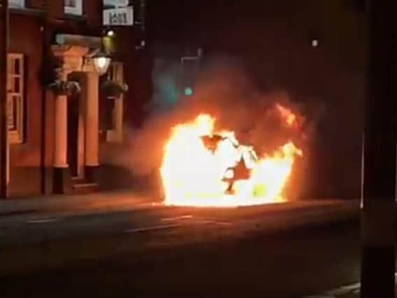 The car on fire outside the Lane Ends pub in Preston (Photo and video courtesy of Jonno Wilson)