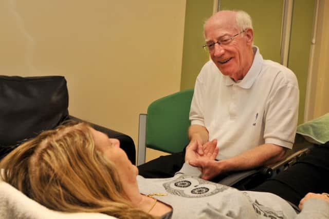 Reflexologist David Jepson works with group member, Karen Lucas at the Gentle Approach to Cancer Centre.