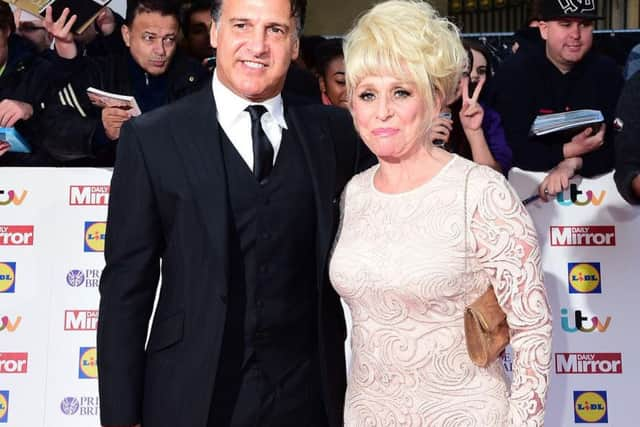 Dame Barbara Windsor and Scott Mitchell, as Mr Mitchell has urged people to check for the early signs of dementia in loved ones on Valentine's Day