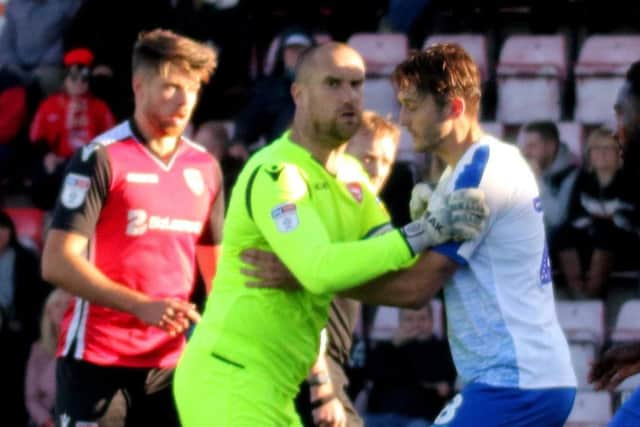 Morecambe skipper Barry Roche is back in full training