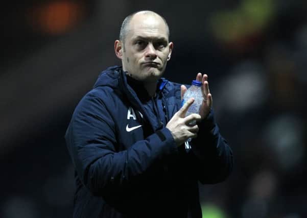 Alex Neil applauds the Preston fans after the win over Norwich