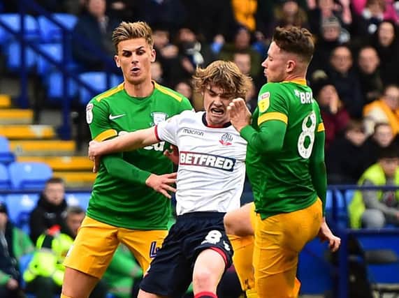 Brad Potts and Alan Browne in the thick of the action against Bolton