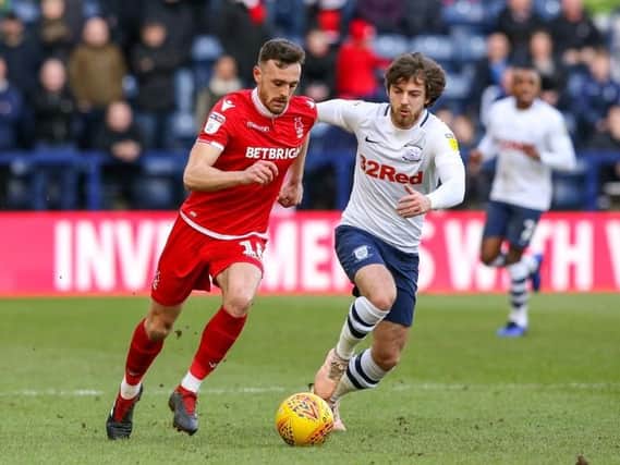 Ben Pearson battles with Jack Robinson at Deepdale on Saturday