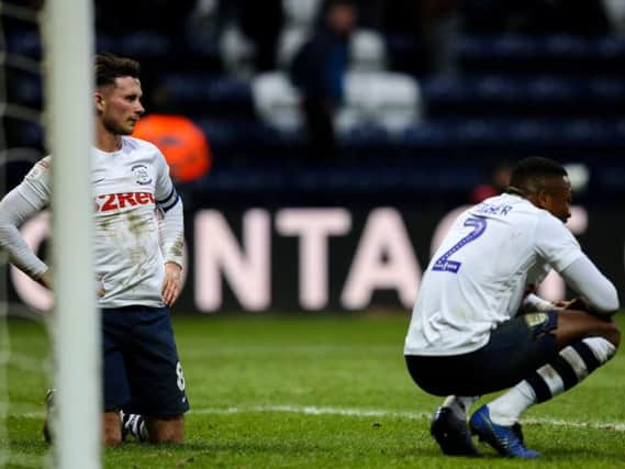 Preston's Alan Browne and Darnell Fisher after the final whistle against Nottingham Forest