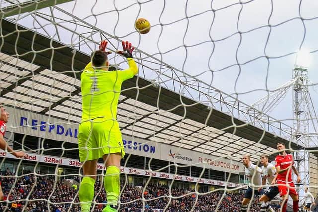 Jordan Storey looks on as Costel Pantilimon makes a save at Deepdale on Saturday