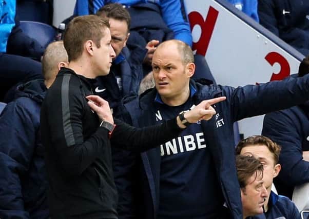 PNE boss Alex Neil makes a point to the fourth official