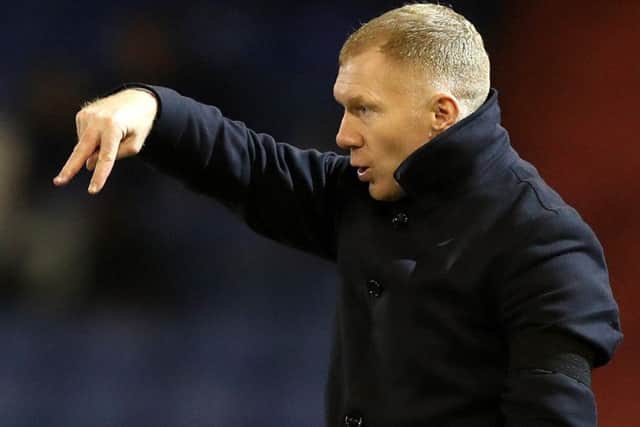 Paul Scholes will be in the opposition dugout tonight when Morecambe travel to Oldham