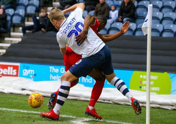 Jayden Stockley wrestles with Tendayi Darikwa during his appearance off the bench against Nottingham Forest