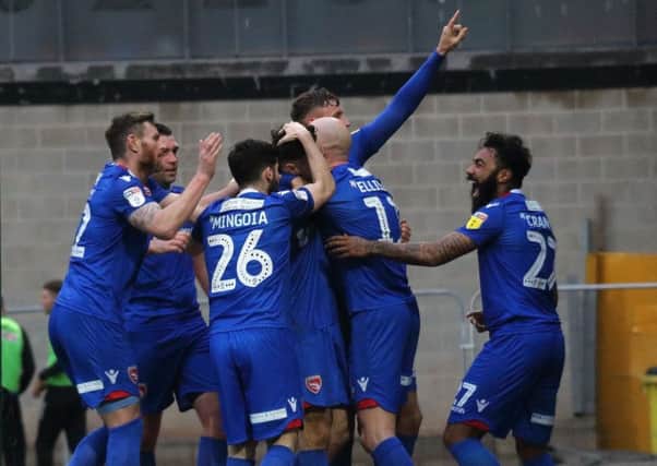 Morecambe celebrate Aaron Collins' goal at Port Vale