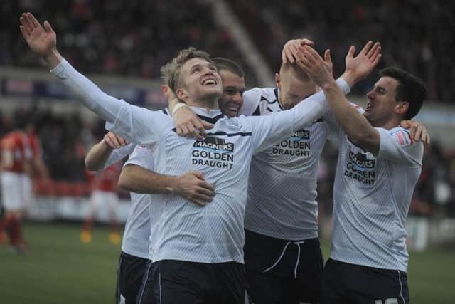 Will Hayhurst celebrates scoring North End's goal at Swindon