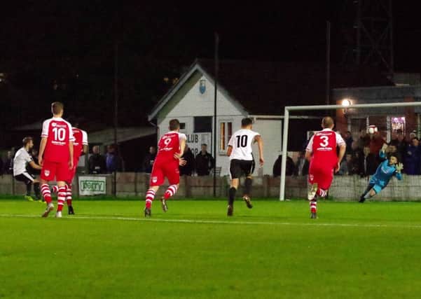 Alistair Waddecar fires home from the spot for Bamber Bridge during their 3-1 win over Colne in the NPL League Cup earlier in the season (photo: Ruth Hornby)