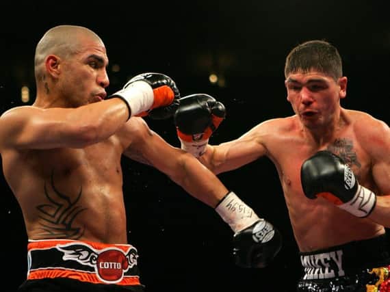 Michael Jennings goes on the offensive against Miguel Cotto on his big night in New York 10 years ago. Picture: Getty Images