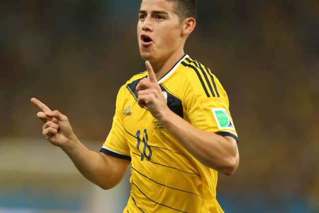 Colombia's James Rodriguez celebrates scoring their first goal of the game during the FIFA World Cup,