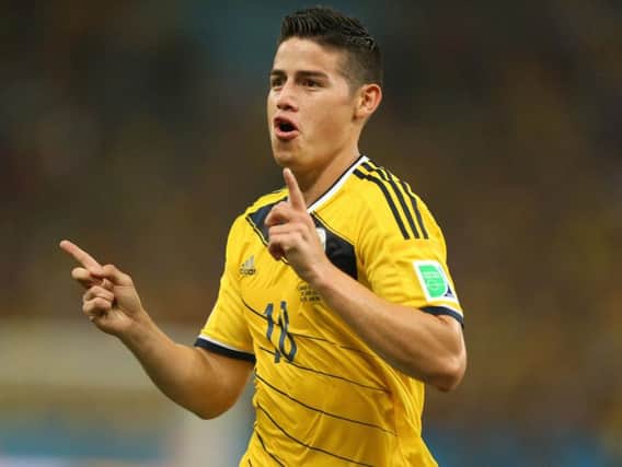 Colombia's James Rodriguez celebrates scoring their first goal of the game during the FIFA World Cup,
