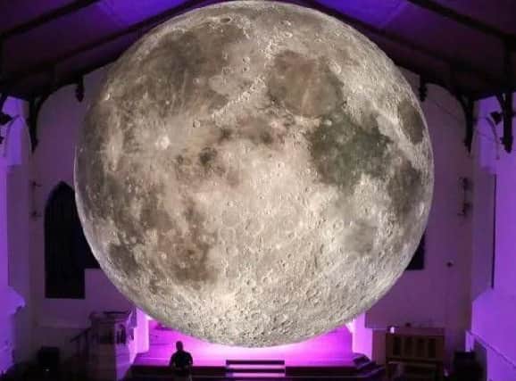 Staff at the Harris Museum said the Museum of the Moon exhibit has been a "victim of its own success" with queues snaking outside the building.