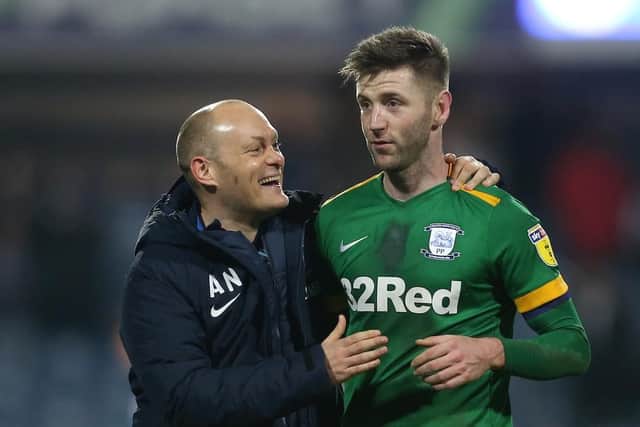 Paul Gallagher celebrates the win at QPR with PNE boss Alex Neil