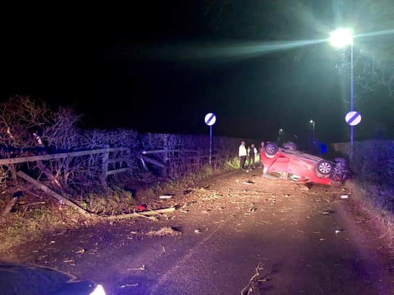The overturned car (photo Lancs Road Police).
