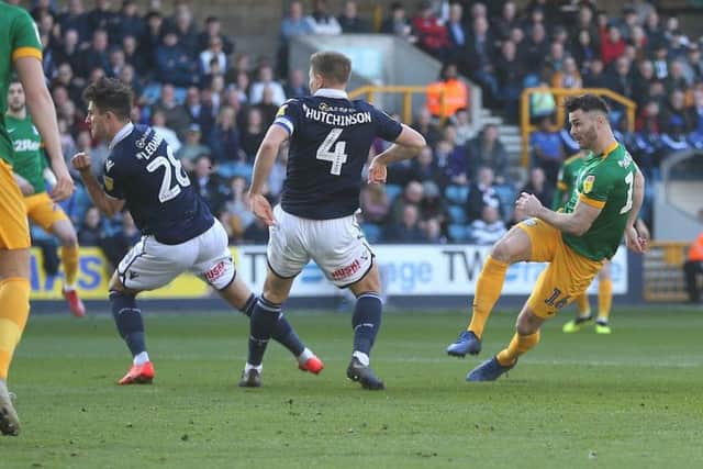 Andrew Hughes fires home PNE's opener at Millwall on Saturday