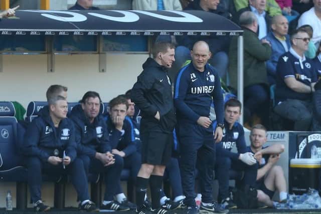 Alex Neil and the North End bench look on during a fourth straight away win