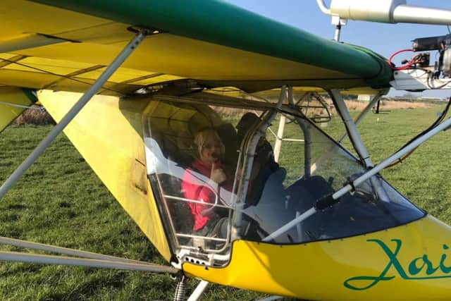 Margaret Lees flies a plane