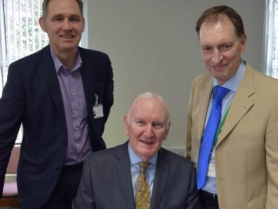Andrew Mather, centre, with John Chesworth, left, Chairman of the Board of Trustees at St Catherines Hospice, and Stephen Greenhalgh, Chief Executive of St Catherines Hospice.