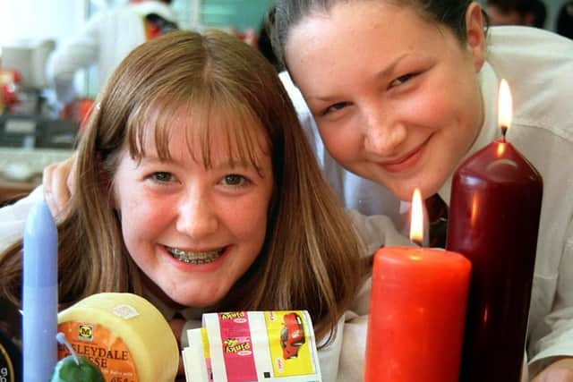 Pupils from Holy Cross High School, Chorley, visiting Dussek Campbell Wax Technology Specialists, Chorley, during an open day were they were shown the many uses for candle wax. With some of the products created there are, year 11 pupils Laura Seddon, right, and Vicky Heaton