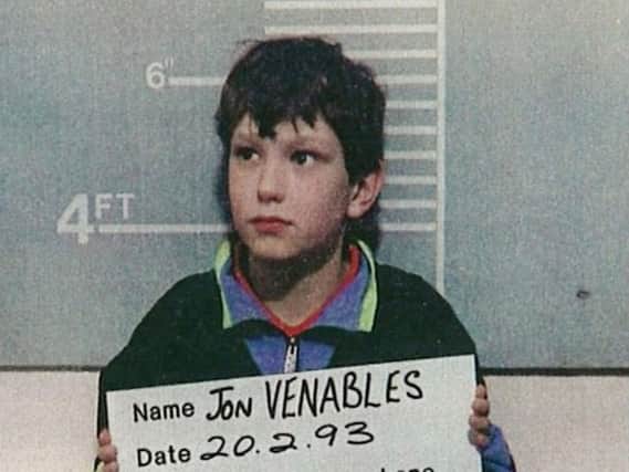 Jon Venables, 10 years of age, poses for a mugshot for police
