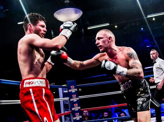 Reece MacMillan goes on the attack against Lee Connelly. Picture: Kevin Gilbo/Eat Sleep Boxing Repeat