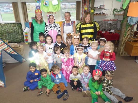 Staff and pupils at Little Acorns Pre-School at Kenning Primary School in Fulwood, Preston, dressed as story book characters