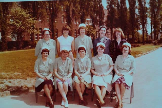 St Mary's Junior School dinner ladies in the 1970s. Eileen Sheridan is sat down at the front left with dark skirt