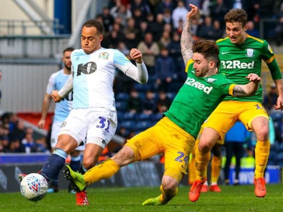 Sean Maguire battles for the ball during Preston's win at Blackburn