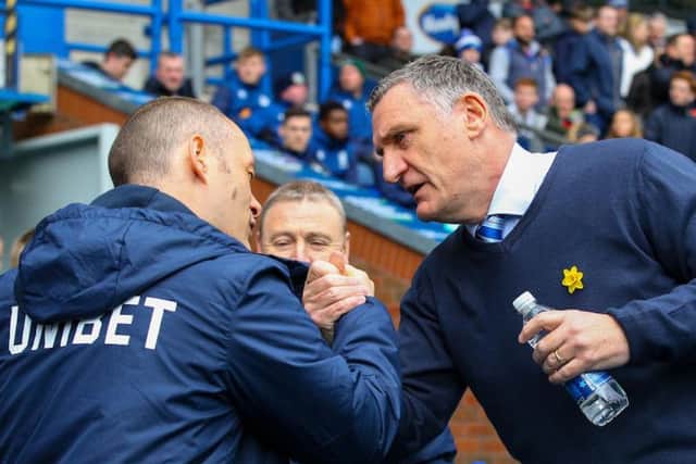 Mowbray greets opposite number Alex Neil at Ewood Park
