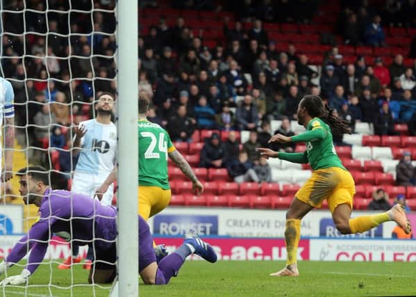 Preston North End's Daniel Johnson wheels away in celebration after scoring the winning goal against Blackburn Rovers