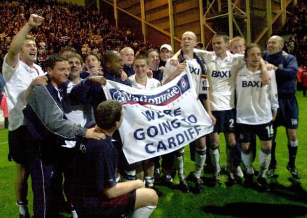 The Preston squad celebrate their dramatic play-off semi-final win over Birmingham City at Deepdale in May 2001