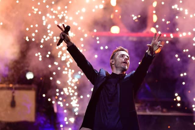 Take That member Gary Barlow performs on stage