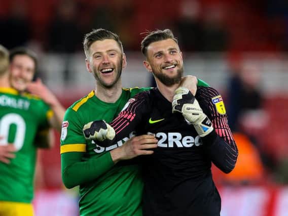 Paul Gallagher celebrates Preston's win at Middlesbrough with Declan Rudd