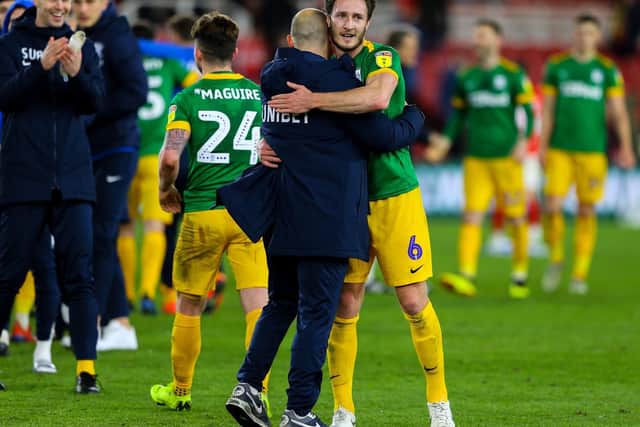 Alex Neil congratulates Ben Davies at the final whistle at Middlesbrough on Wednesday night