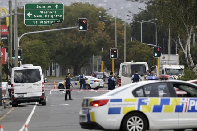 Police block the road near the shooting at a mosque in Linwood, Christchurch, New Zealand, Friday, March 15, 2019. Multiple people were killed during shootings at two mosques full of people attending Friday prayers. (AP Photo/Mark Baker)