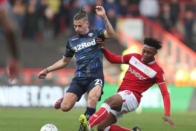 Leeds United's Kalvin Philips is tackled by Bristol City's Antoine Semenyo