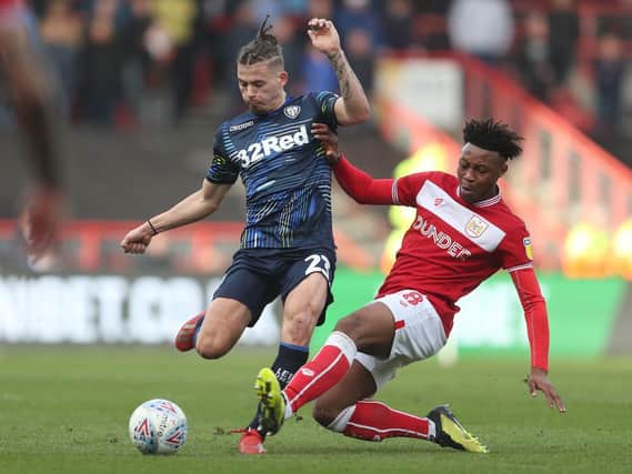 Leeds United's Kalvin Philips is tackled by Bristol City's Antoine Semenyo