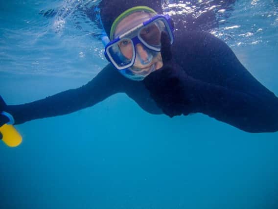 Catherine Galaska snorkelling at the Great Barrier Reef, Australia