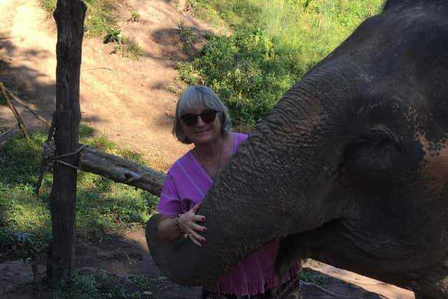 Catherine Galaska with an elephant in Chiang Mai, Thailand