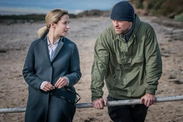 Jonas with co-star Morven Christie on location around Morecambe